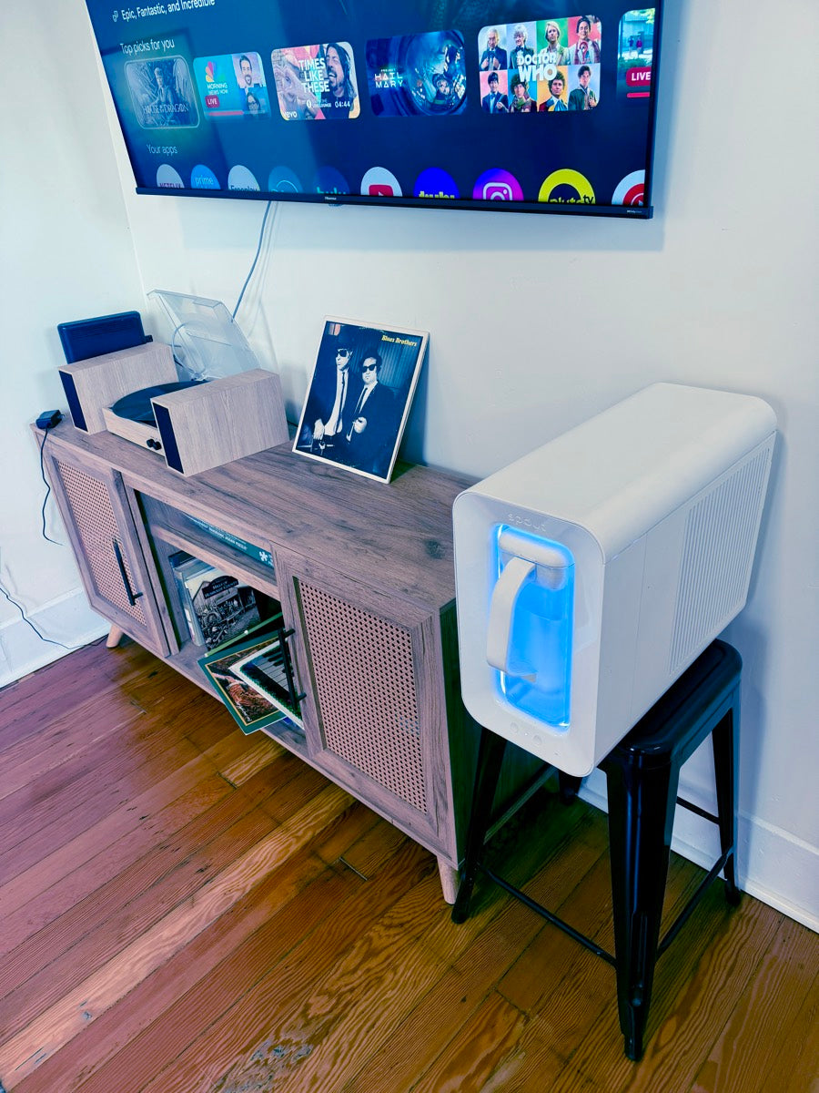 Spout Monolith on a stool in a living room