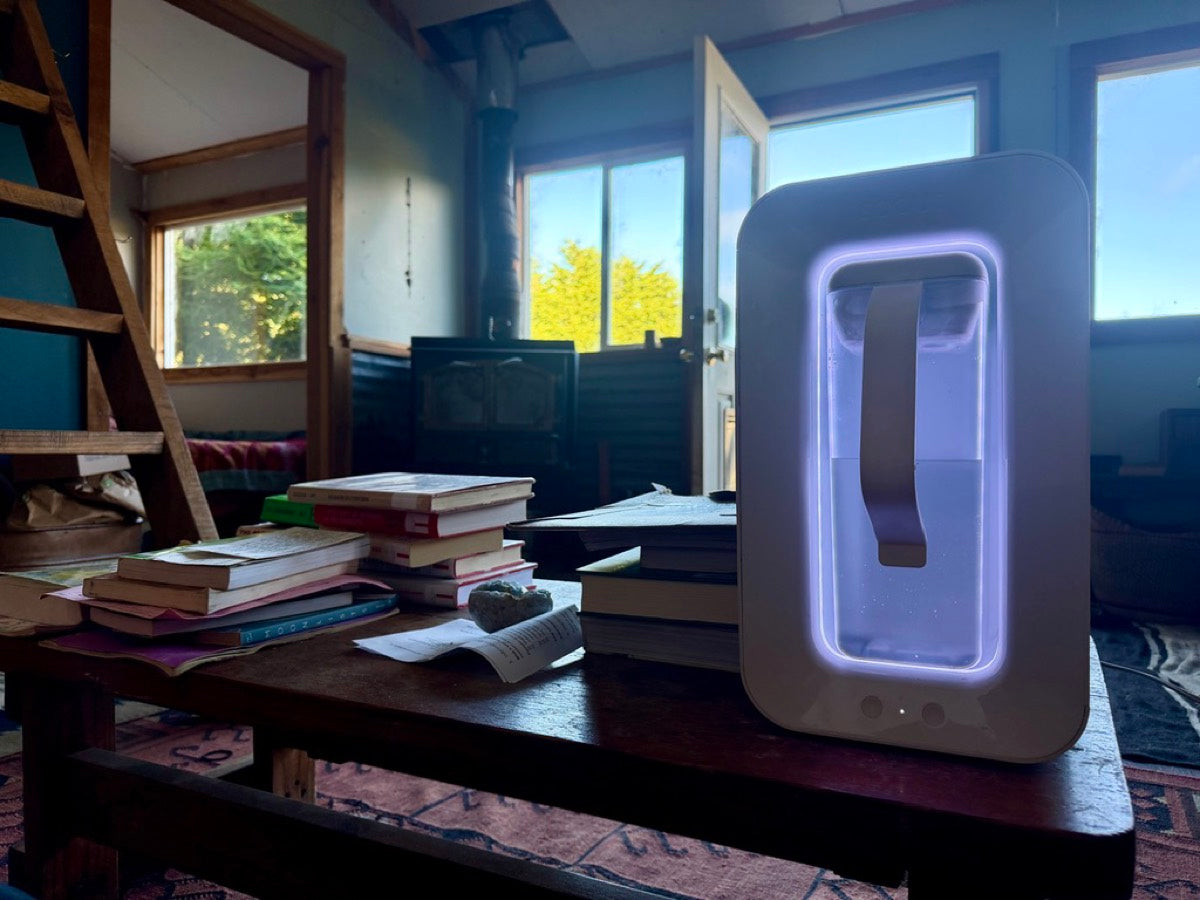 Spout Monolith glowing on a table in a cabin