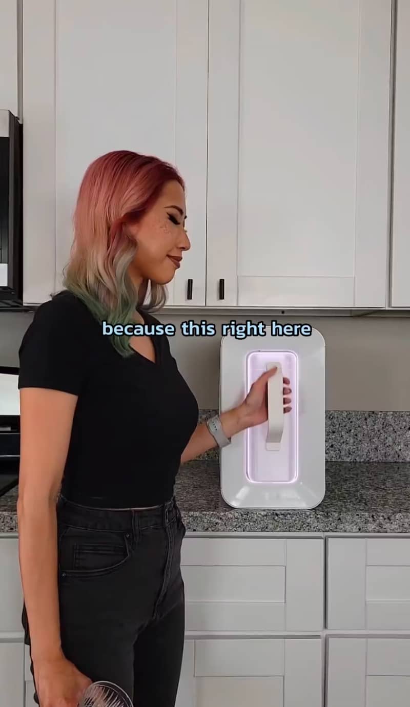 woman using Spout water machine