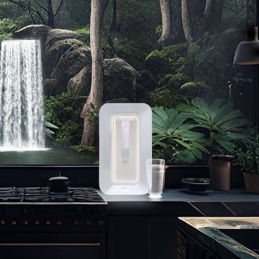 Spout atmospheric water generator durrounded by plants